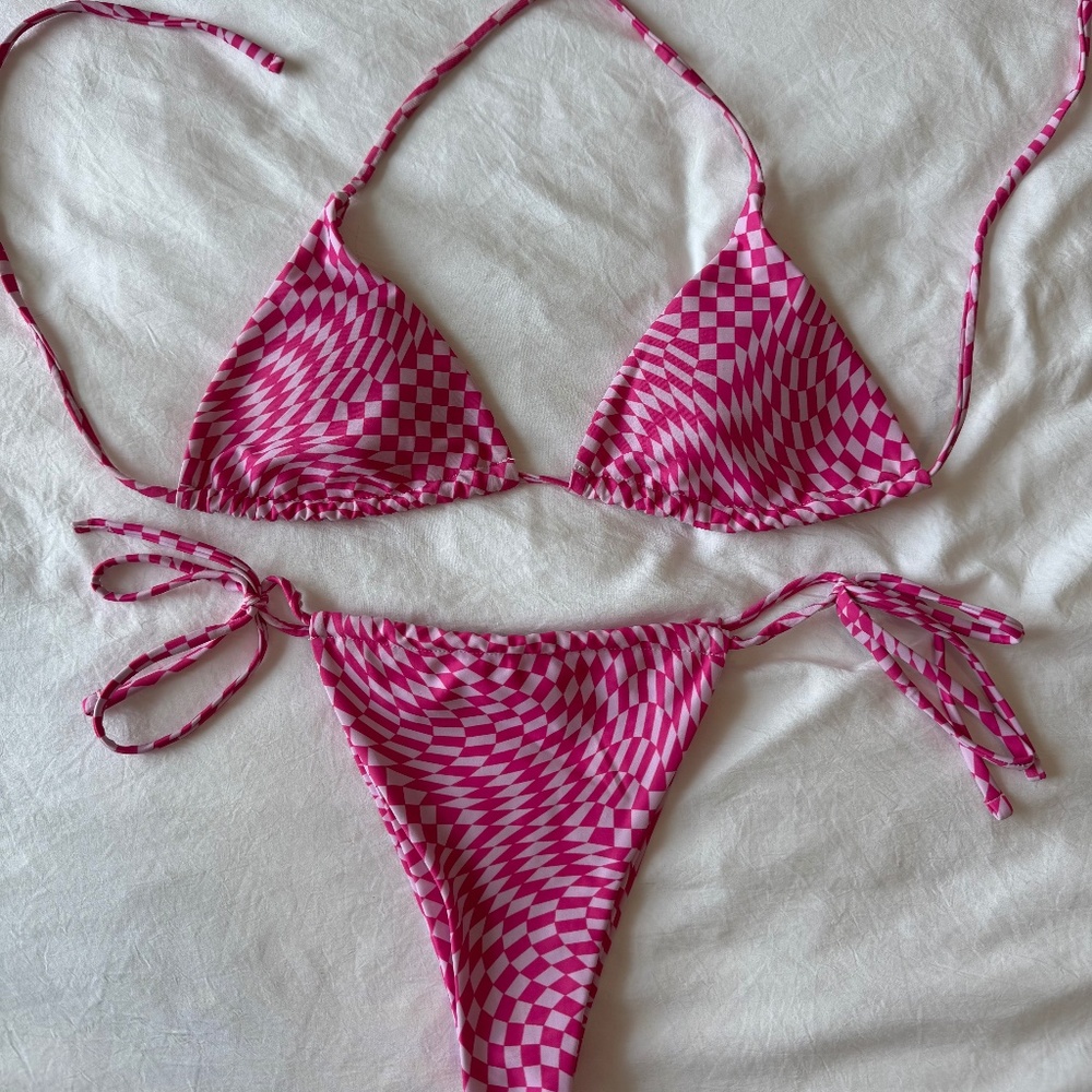 Pink checkered bikini and red Roxy bikini